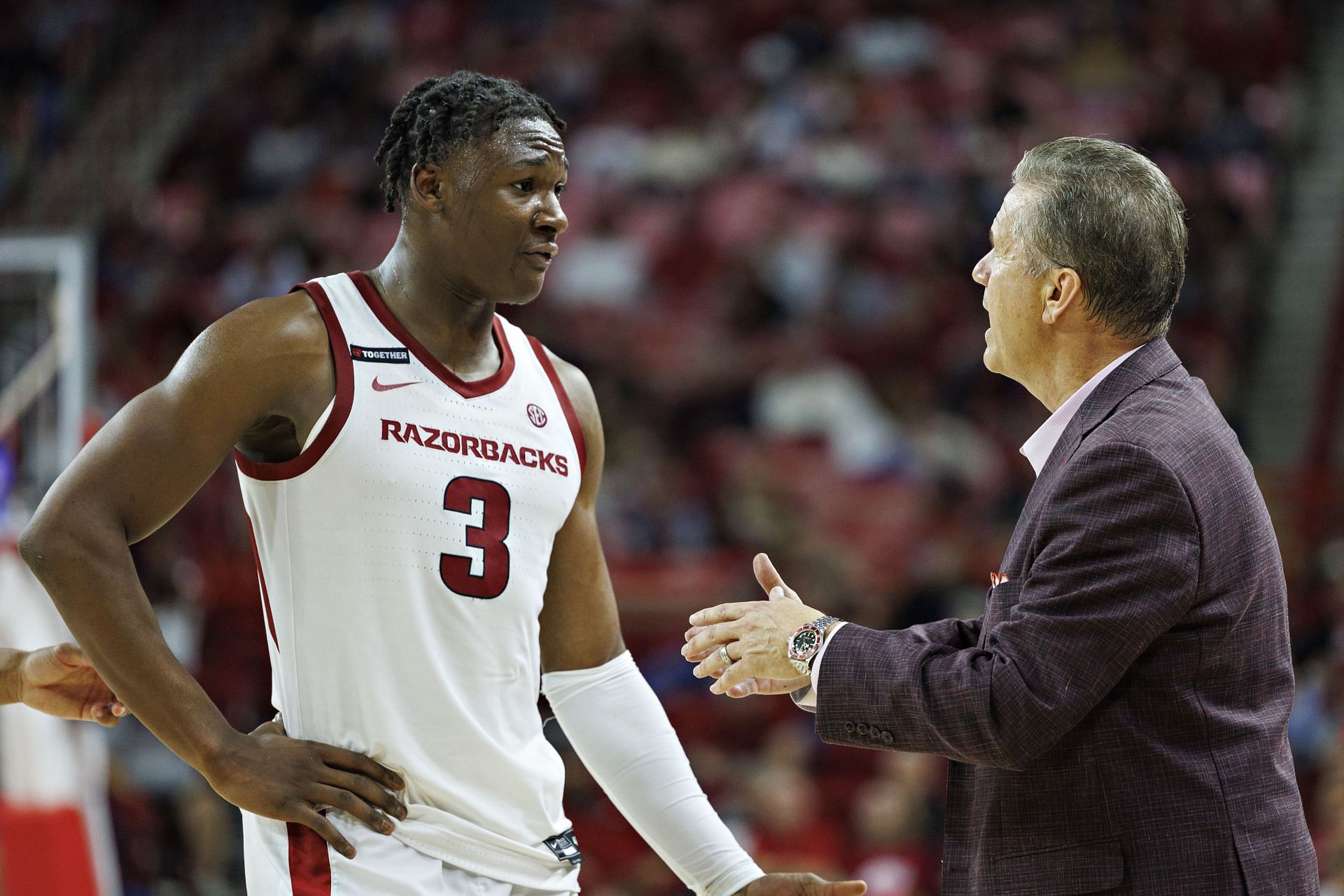 Arkansas coach John Calipari talks with Adou Thiero (#3) in the second half of their game against the UALR Trojans at Bud Walton Arena on November 22, 2024. Photo: Getty
